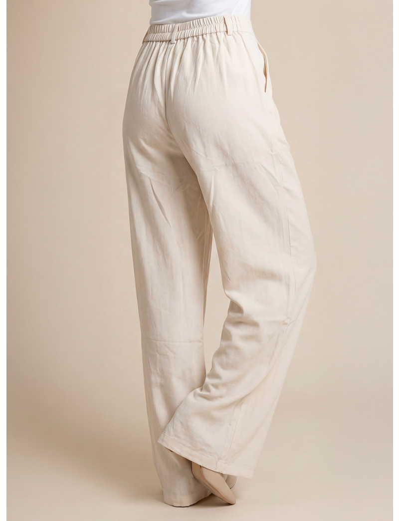 FLUID TROUSERS WITH SINGLE PLEAT AND ELASTIC WAIST